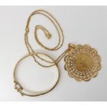 An 18ct gold Arabic symbol pendant diameter 5.2cm, with 18ct rope chain length 60cm, combined weight