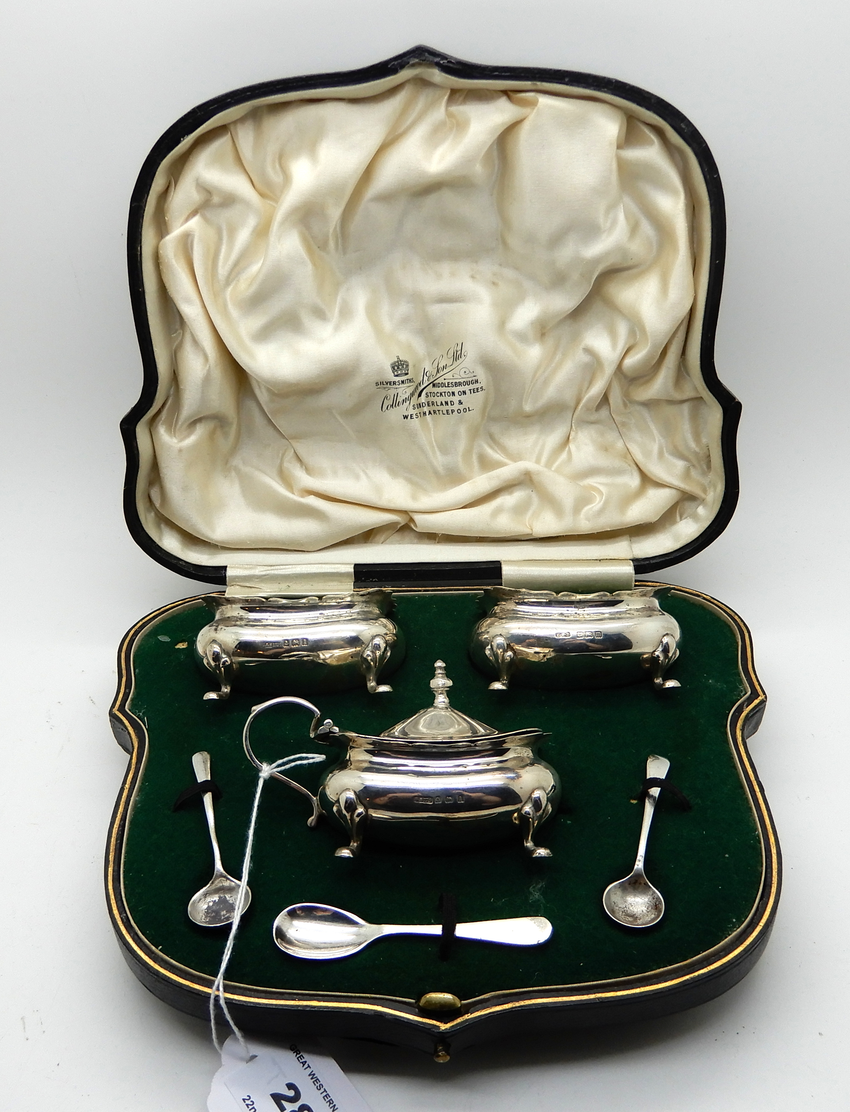 A cased three piece silver condiment set, Birmingham 1910 Condition Report: Available upon request