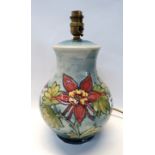 A Moorcroft aquilegia/columbine lamp of bulbous form, 25cm high Condition Report: Available upon