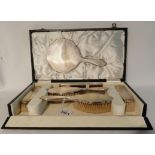 A cased six piece silver dressing table set, London 1964 Condition Report: Available upon request