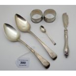 A lot comprising a pair of silver tablespoons, London 1804, a pair of silver napkin rings, a