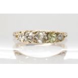 An 18ct gold five stone diamond ring (one stone missing) set with estimated approx 0.19cts of old