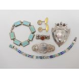 A silver and enamel James Fenton bracelet, silver family crest brooch and other items Condition