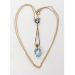 A 9ct gold blue gem pendant necklace, length of pendant drop 4.3cm, length of chain 40cm, weight 2.