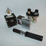 A box of miscellaneous including table clock, large lighter etc Condition Report: Available upon