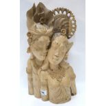 A Balinese carved wooden bust of a couple Condition Report: Available upon request