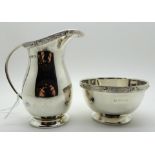 A silver cream and sugar, Birmingham 1958, cream jug 9cm high, 153gms Condition Report: Available