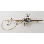 A 9ct gold blue gem set spider brooch, length 6cm, weight 4.2gms Condition Report: Available upon
