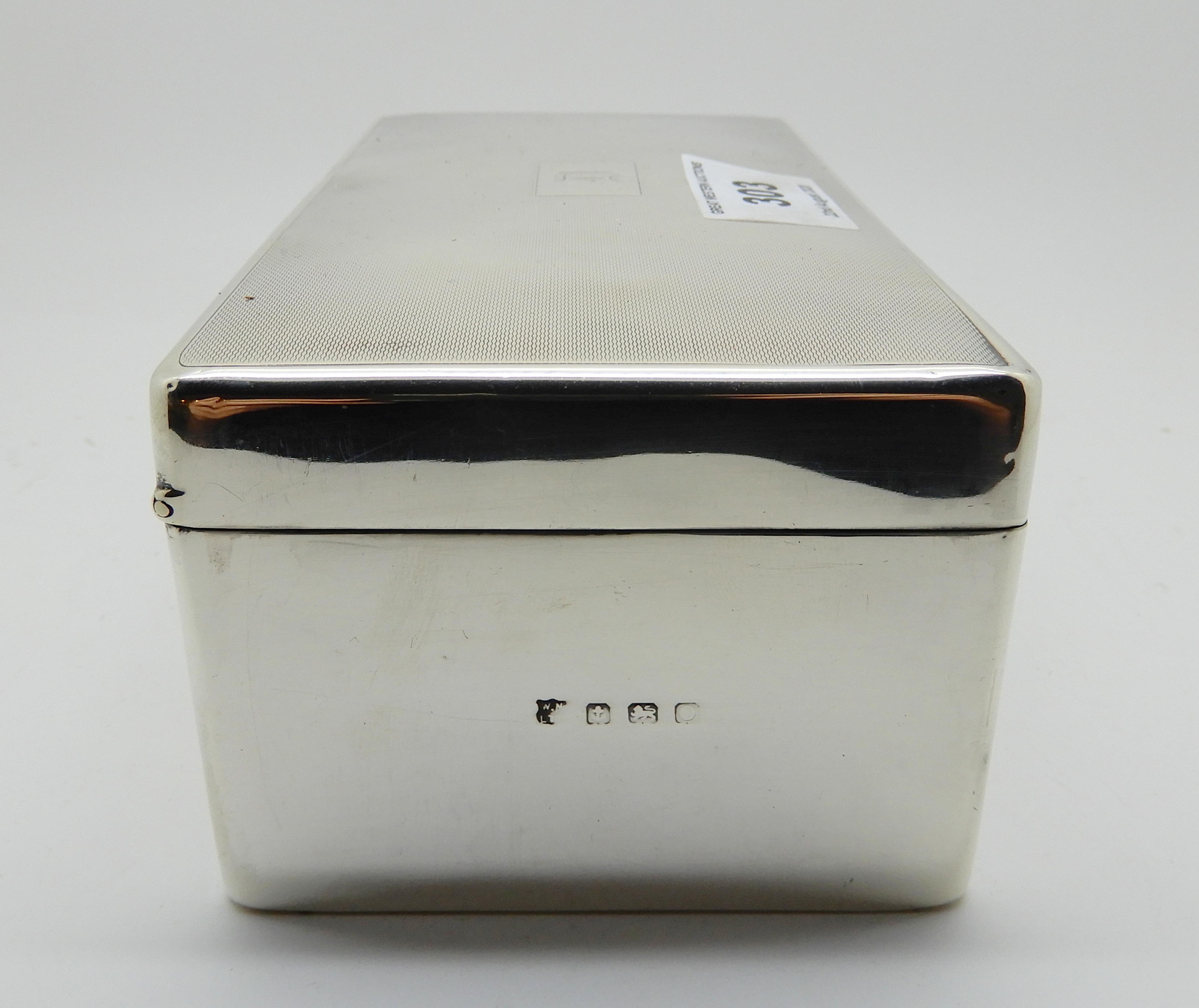 A lot comprising a silver cigarette box, a silver topped sugar castor, silver sugar tongs, silver - Image 5 of 6