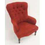 A red upholstered armchair with turned mahogany legs Condition Report: Available upon request