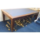 A mahogany library table with blue rexine top and frieze drawers, 76cm high x 243cm wide x 121cm