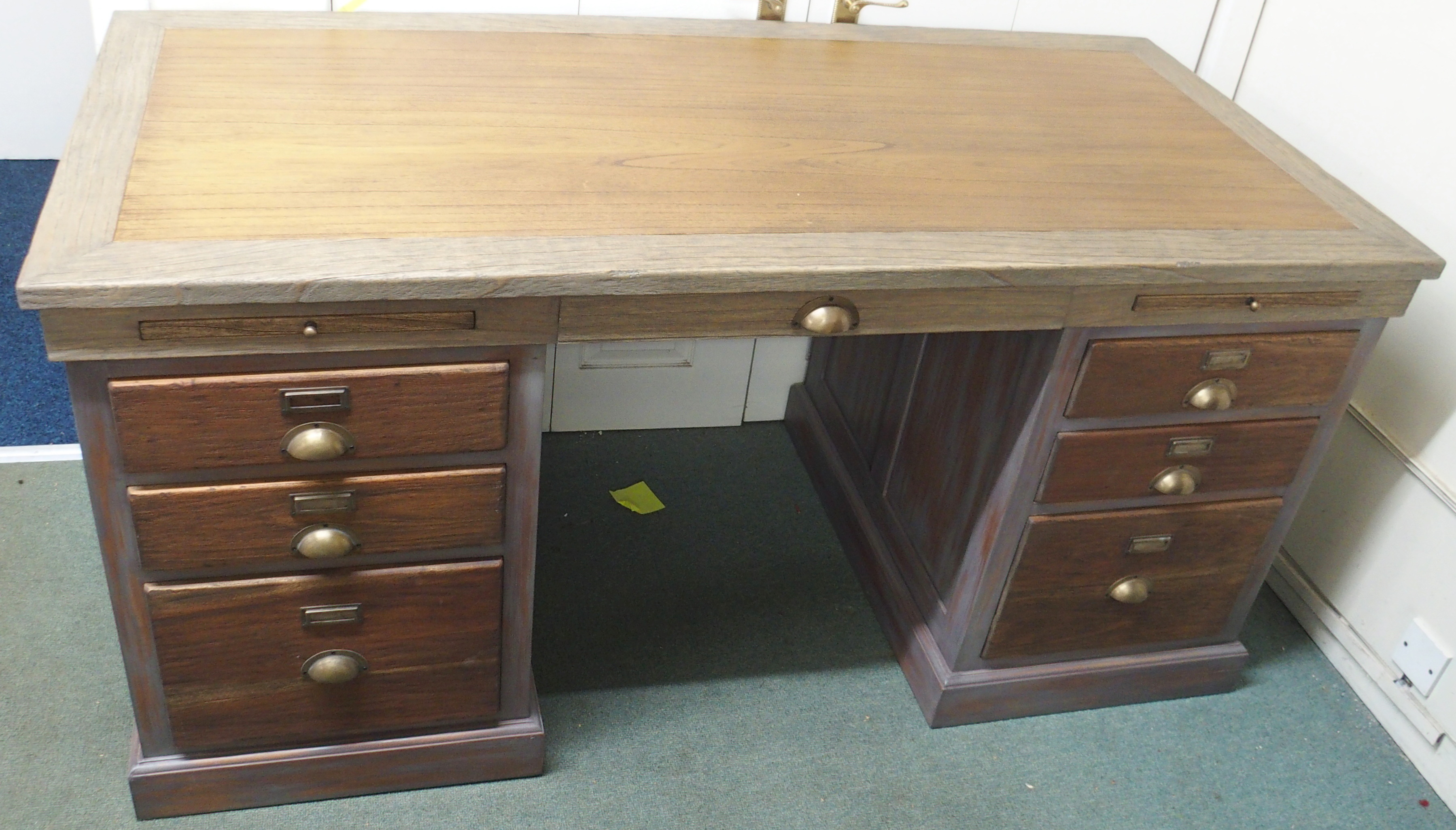 A large twin pedestal desk, 82cm high x 170cm wide x 79cm deep Condition Report: Available upon