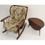 A n Ercol side table and a mid-Century armchair (2) Condition Report: Available upon request