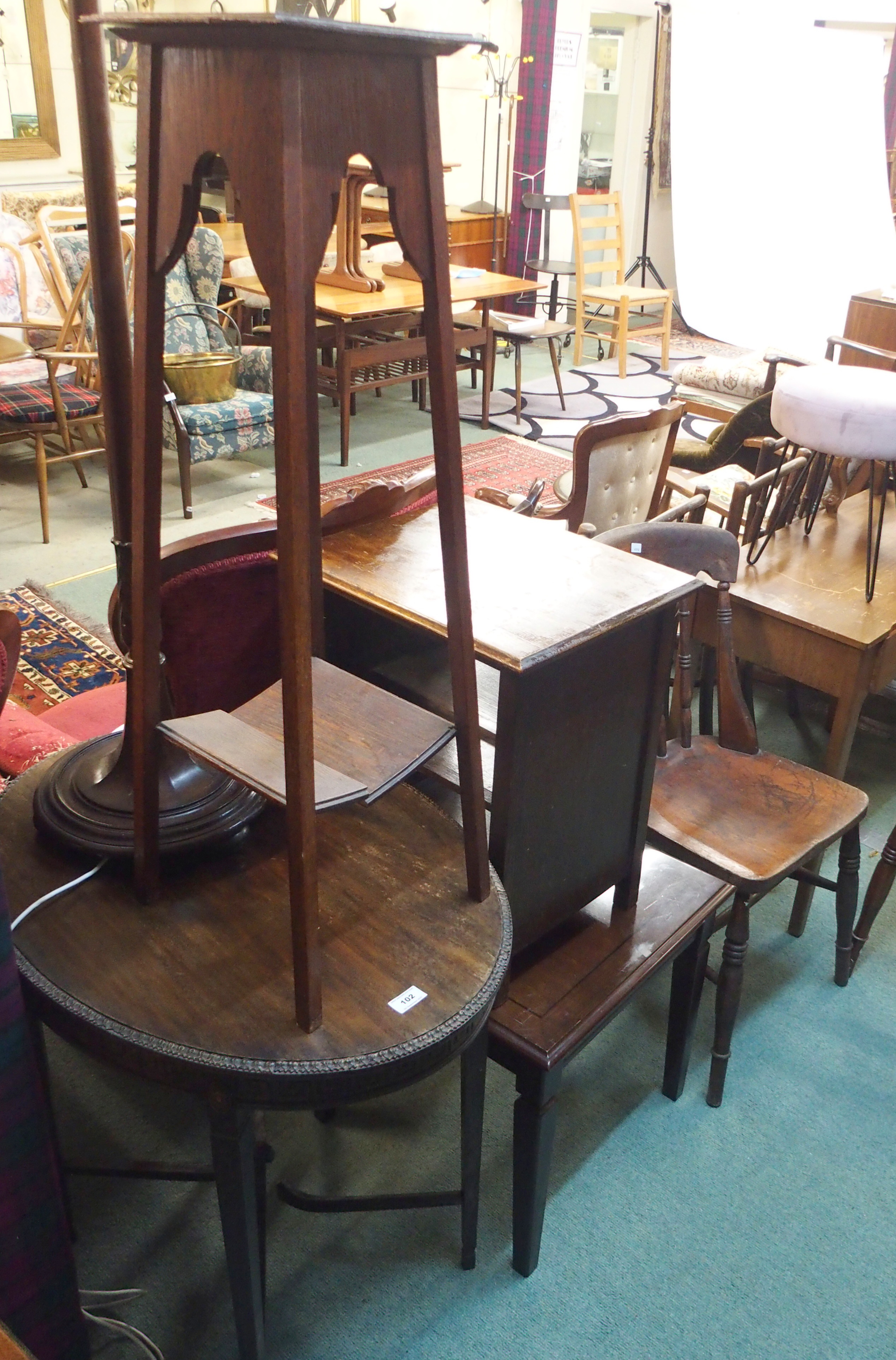 A standard lamp, occasional tables and two chairs Condition Report: Available upon request