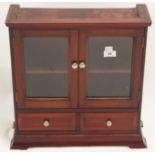 A miniature mahogany cabinet, 47cm high x 47cm wide x 18cm deep Condition Report: Available upon