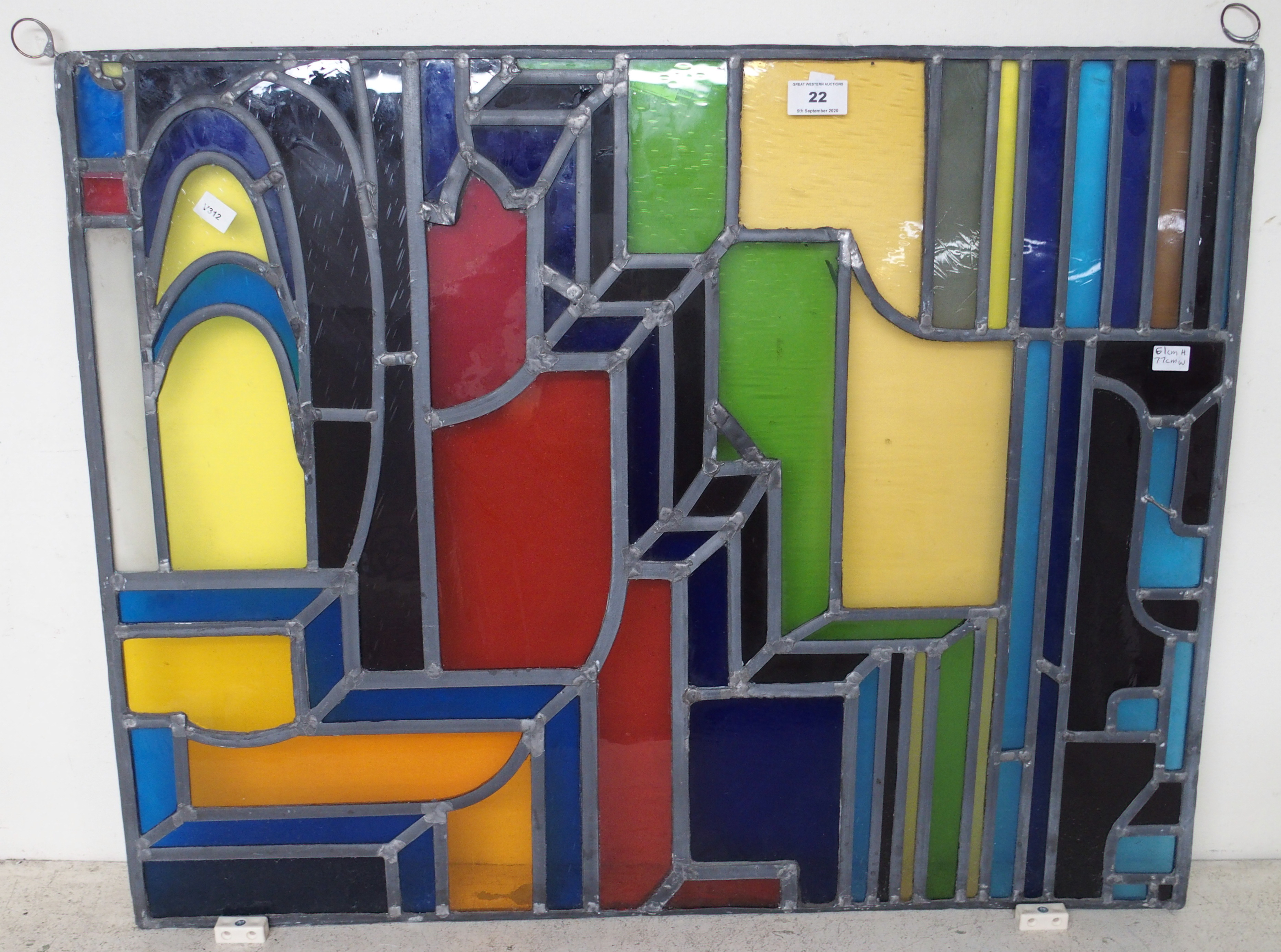 A leaded and stained glass panel, 61cm high x 77cm wide Condition Report: Available upon request