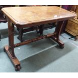 A Victorian mahogany library table with turned stretcher, 71cm high x 106cm wide x 50cm deep
