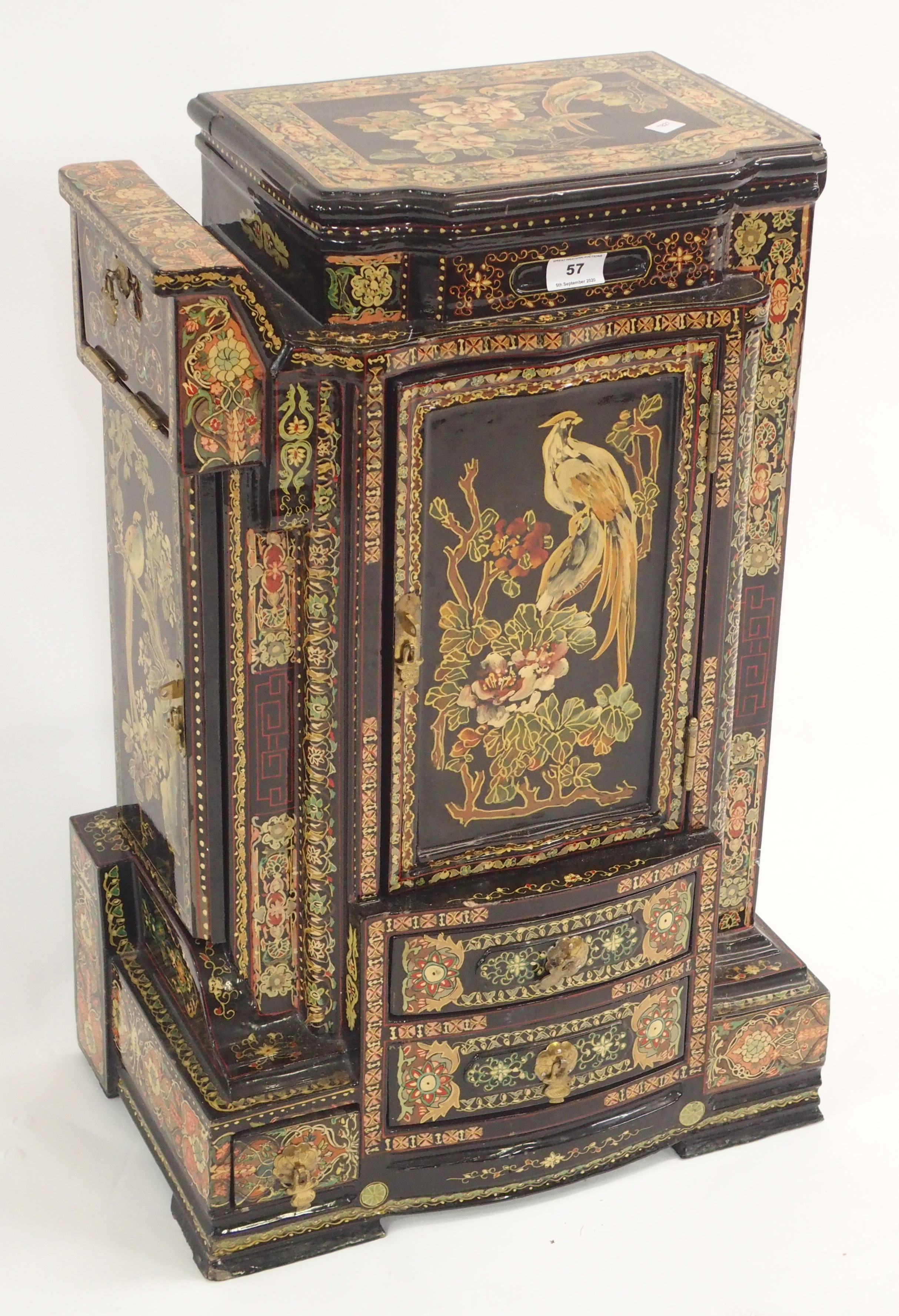 An oriental black lacquer small cabin with multiple drawers and doors, 71cm high x 46cm wide x