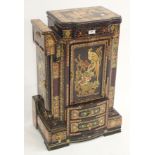 An oriental black lacquer small cabin with multiple drawers and doors, 71cm high x 46cm wide x