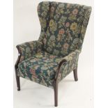 A Parker Knoll wingback chair Condition Report: locked, no key.