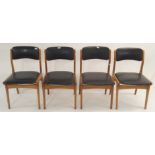 A set of four mid-Century dining chairs with vinyl seat and backs (4) Condition Report: Available