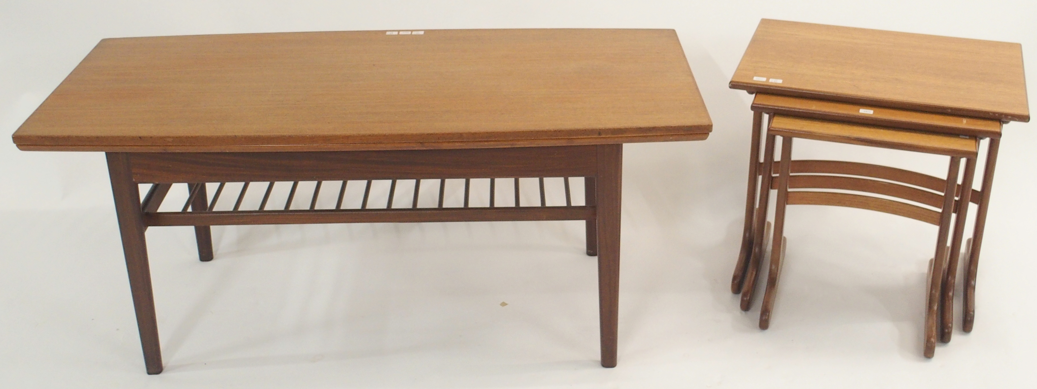 A mid-Century Danish metamorphic teak table and a teak nest of three tables (2) Condition Report: