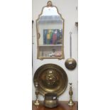 A wall mirror and assorted brassware Condition Report: Available upon request