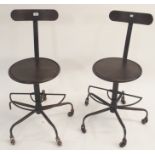 A pair of industrial metal swivel chairs (2) Condition Report: Available upon request