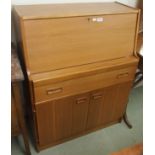 A mid-Century teak bureau, 107cm high x 84cm wide x 43cm deep Condition Report: Available upon