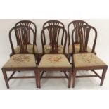 A set of six carved mahogany dining chairs with woolwork seats (John Taylor & Son, Edinburgh) (6)