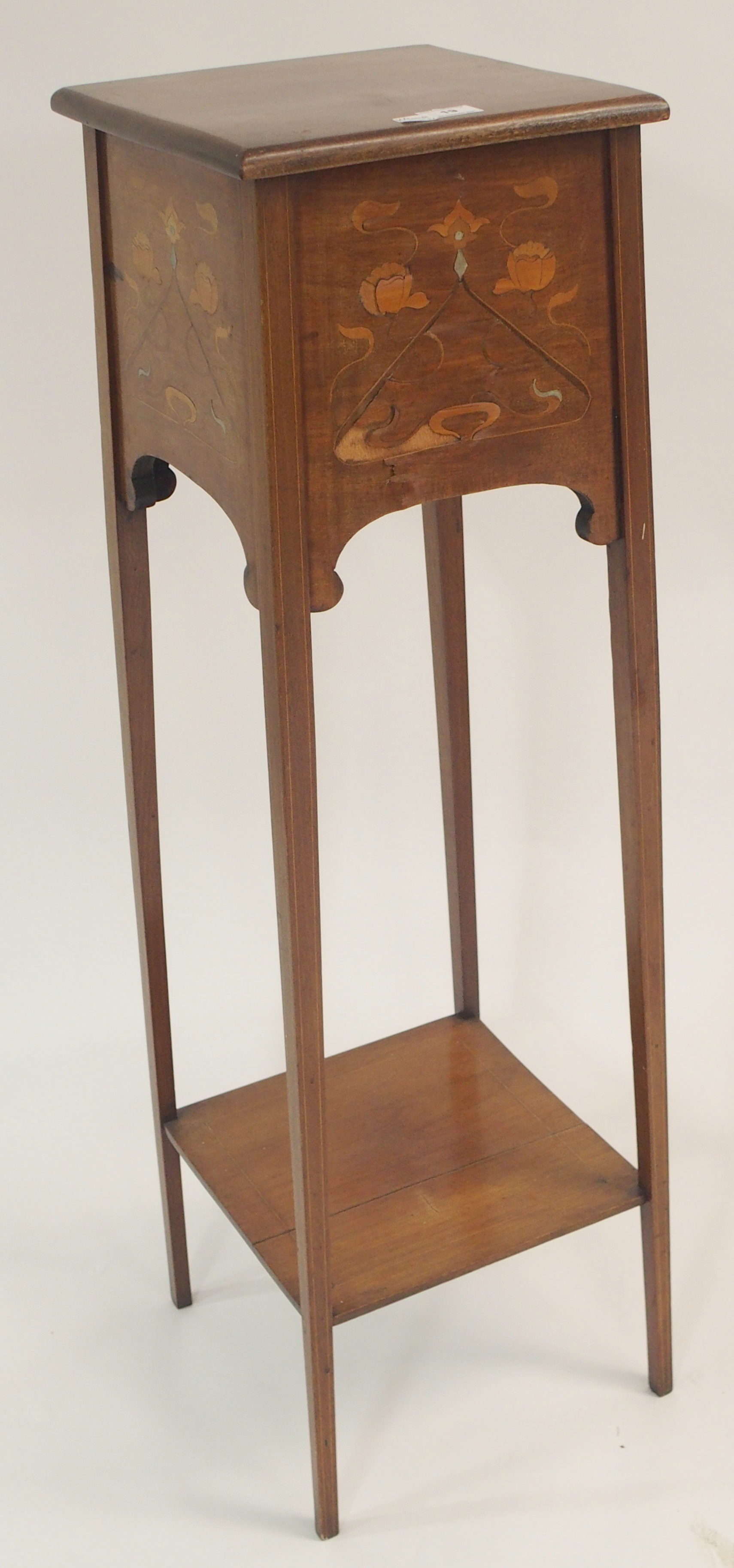 An Art Nouveau inlaid mahogany plant stand, 109cm high Condition Report: Available upon request