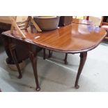 A mahogany drop leaf table Condition Report: Available upon request