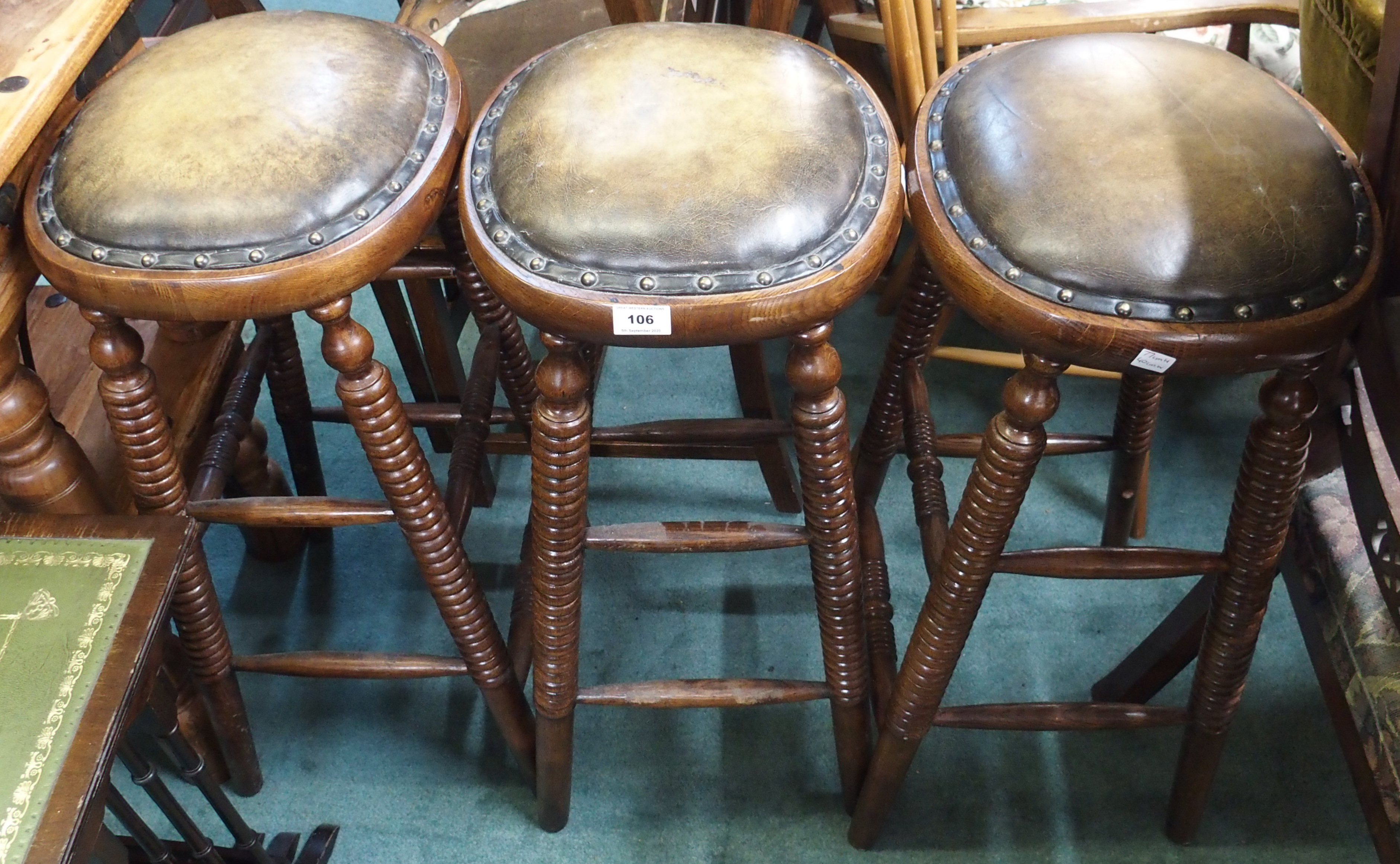 Three bar stools with turned legs, 77cm high (3) Condition Report: Available upon request