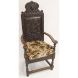 A Victorian carved oak hall armchair Condition Report: Available upon request
