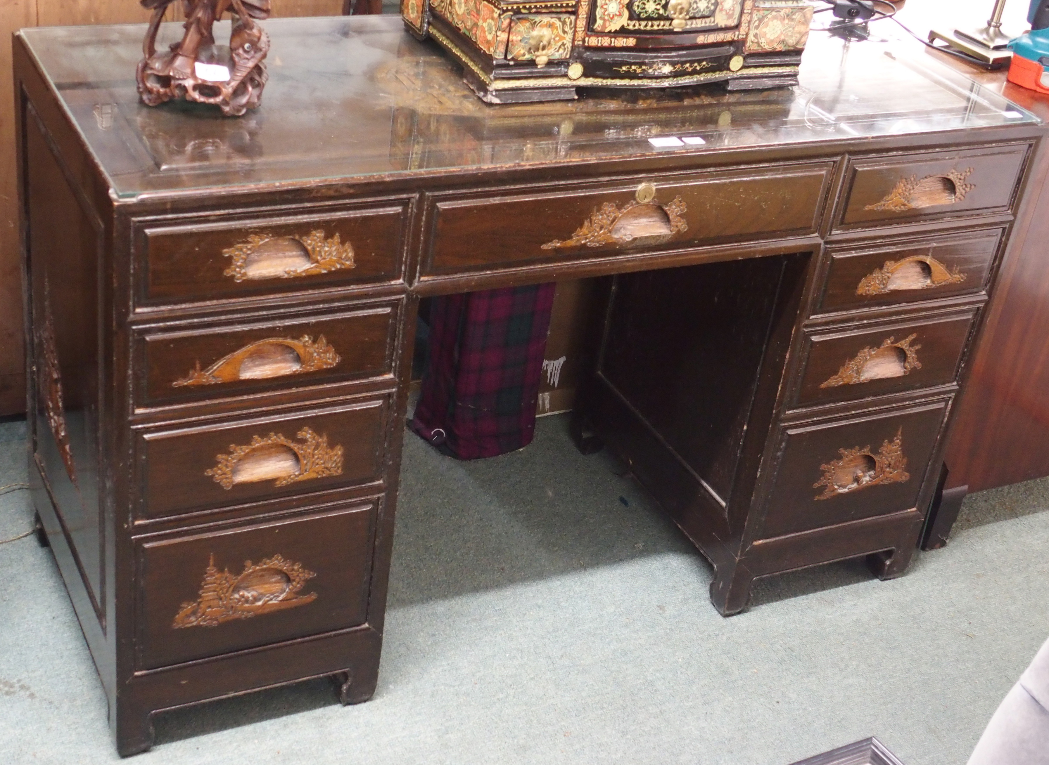 An oriental style twin pedestal desk, 79cm high x 127cm wide x 51cm deep Condition Report: Available