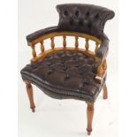 A brown leather captains chair Condition Report: Available upon request