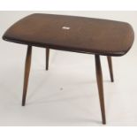 A dark Ercol side table and a small wool rug, 80cm x 150cm (2) Condition Report: Available upon