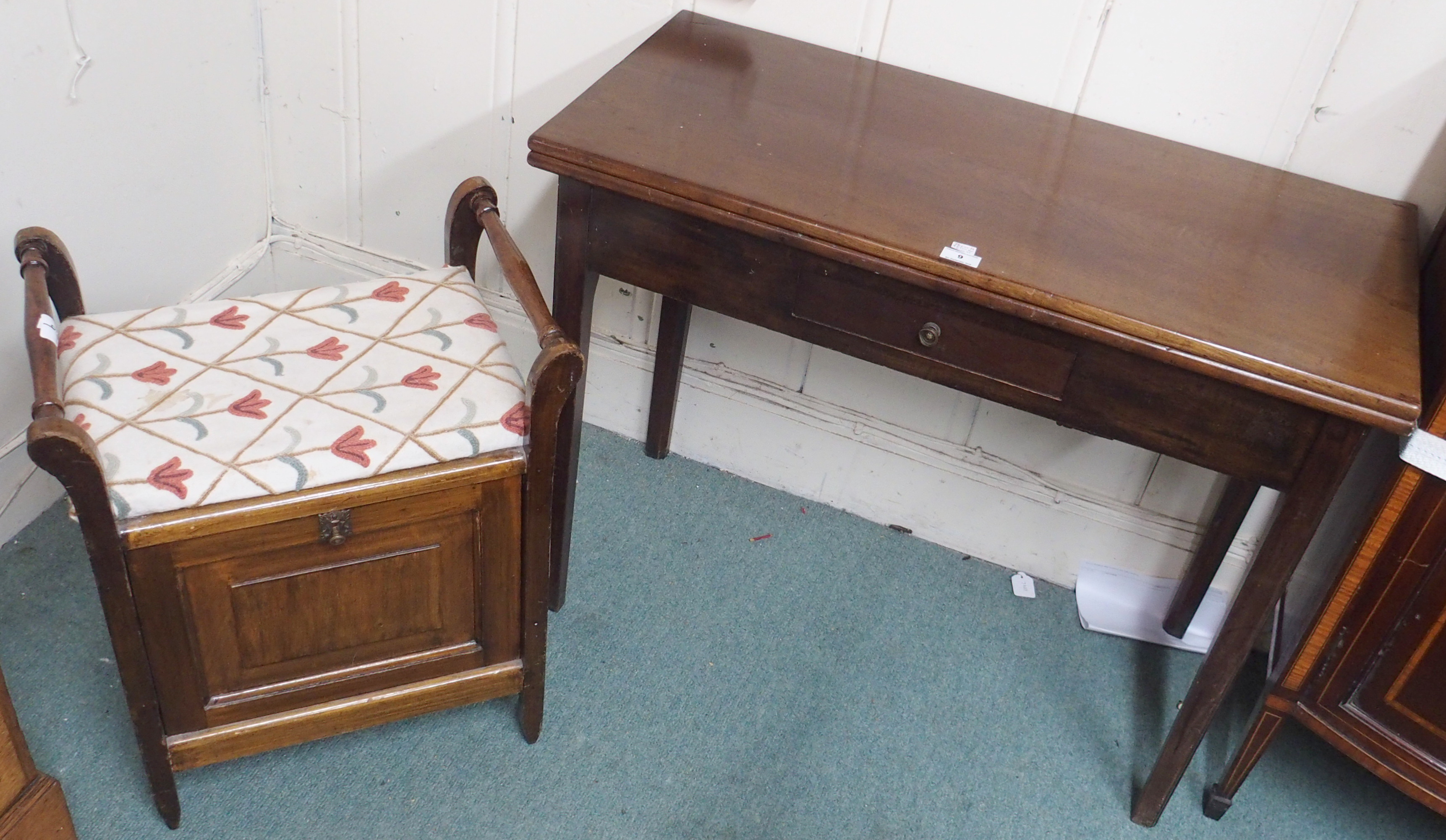 A piano stool and a mahogany fold-over table (2) Condition Report: Available upon request