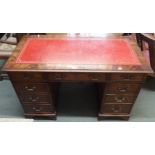 A mahogany pedestal desk with red leather skiver, 78cm high x 122cm wide x 61cm deep Condition