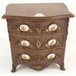 A miniature three drawer chest with ceramic plaques, 33cm high x 30cm wide x 24cm deep Condition