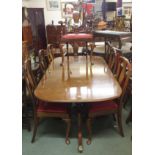 A mahogany twin pedestal extending dining table with six dining chairs and two carvers (9) Condition