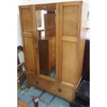An oak inlaid wardrobe with single mirrored door and lower drawer, 195cm high x 122cm wide x 44cm