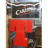 A Tennents illuminated wall pub sign and a Carling pub sign (2) Condition Report: Available upon