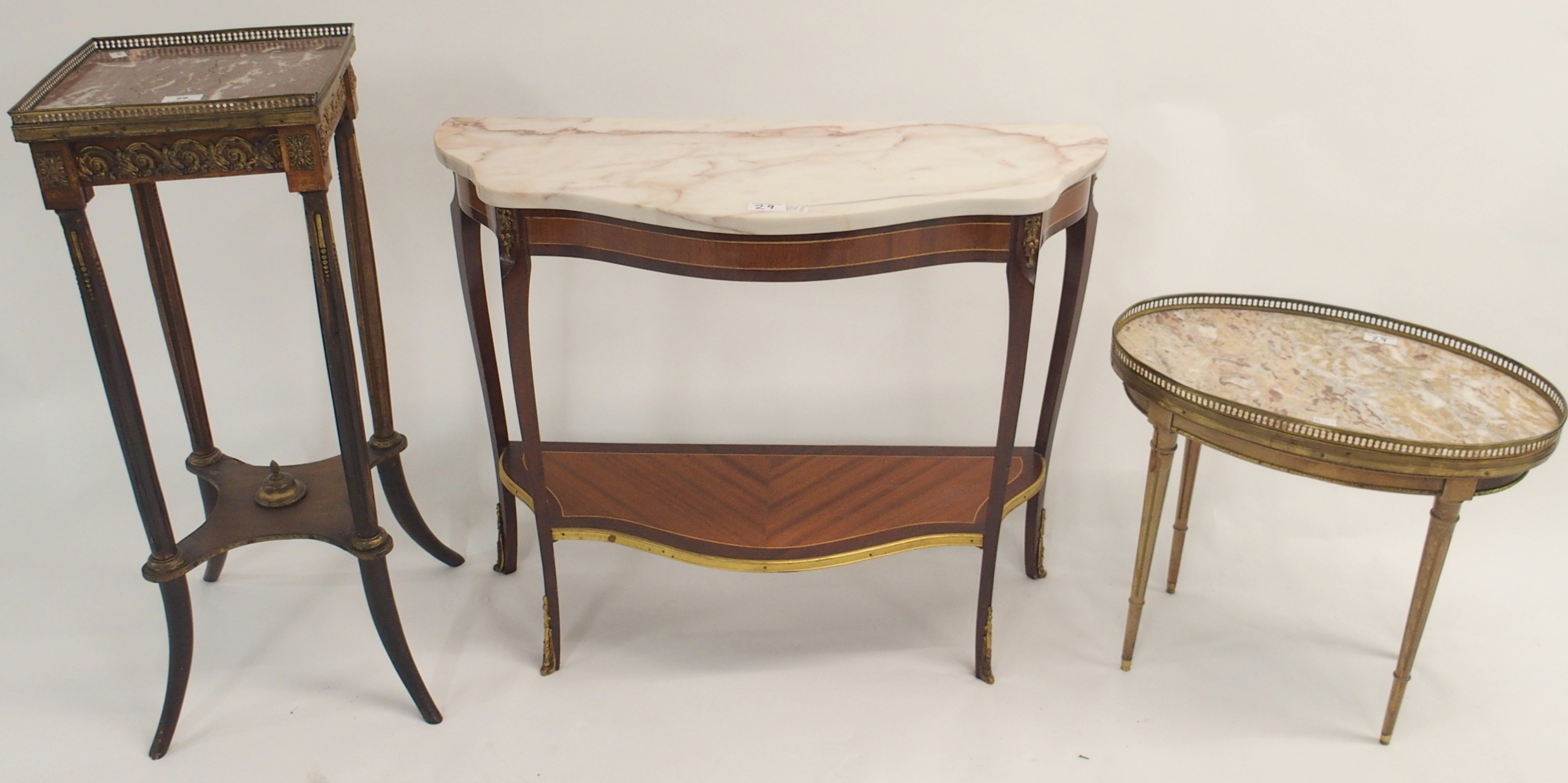 A marble topped pedestal table, 80cm high x 35cm wide x 35cm deep, small oval marble topped