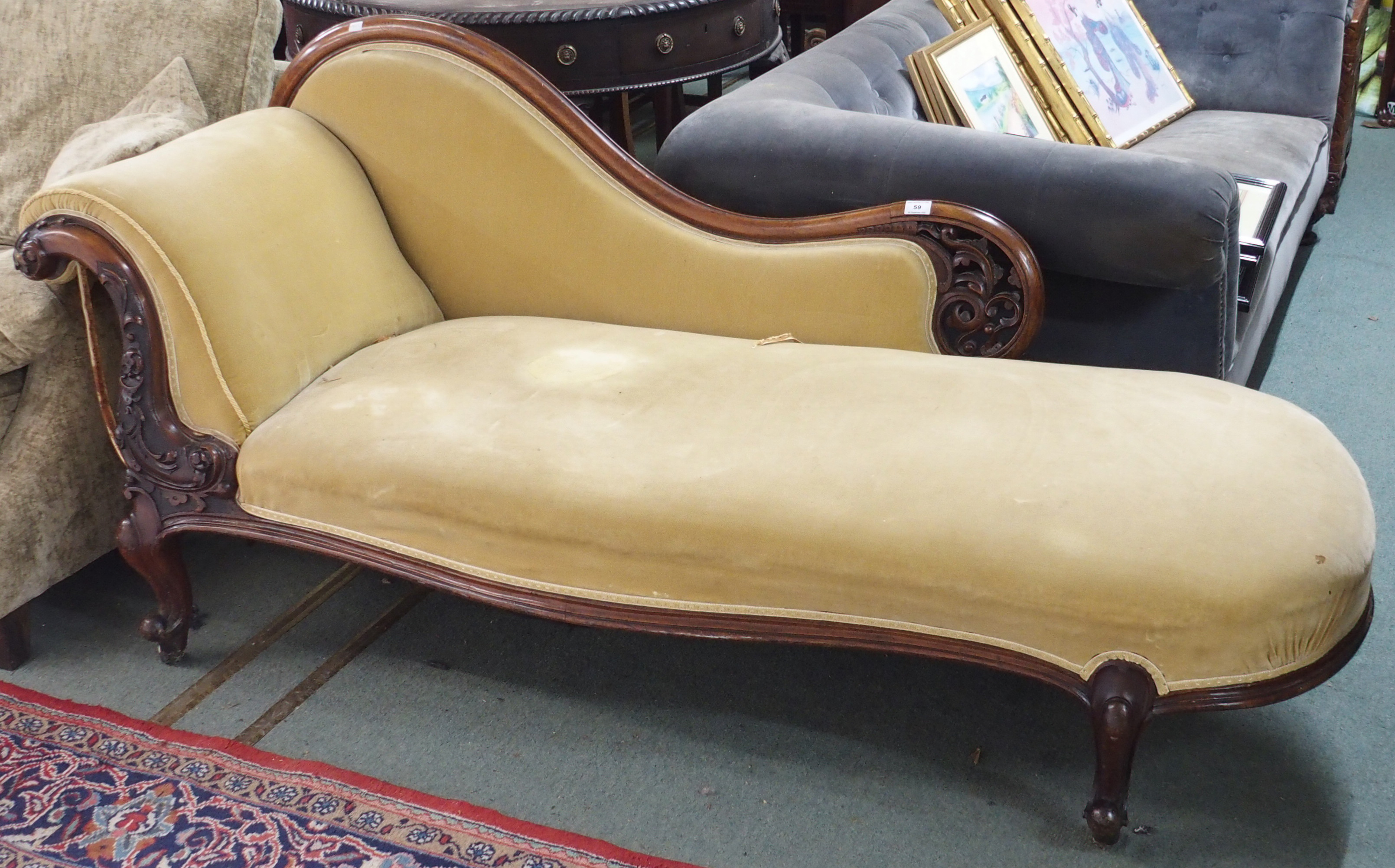 A Victorian mahogany chaise longue with serpentine front carved back Condition Report: Available