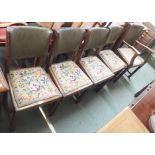 Four oak dining chairs with woolwork seats with matching carver (5) Condition Report: Available upon