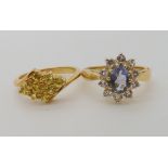 A 9ct yellow sapphire cluster ring size O, and a 9ct iolite and white topaz ring size N1/2, combined