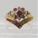 A 9ct gold ruby and diamond retro cluster ring size L (one ruby missing), together with a 9ct ruby