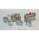A Dunhill lighter, other lighters, assorted silver napkins rings etc Condition Report: Available