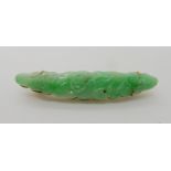 A flower carved Chinese green hardstone brooch, stamped 9k LYK possibly Lee Yee King of Hong Kong,